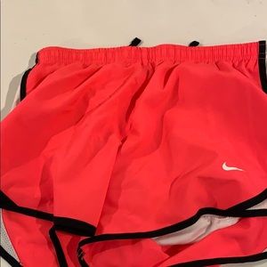 bright pink/ orange nike shorts